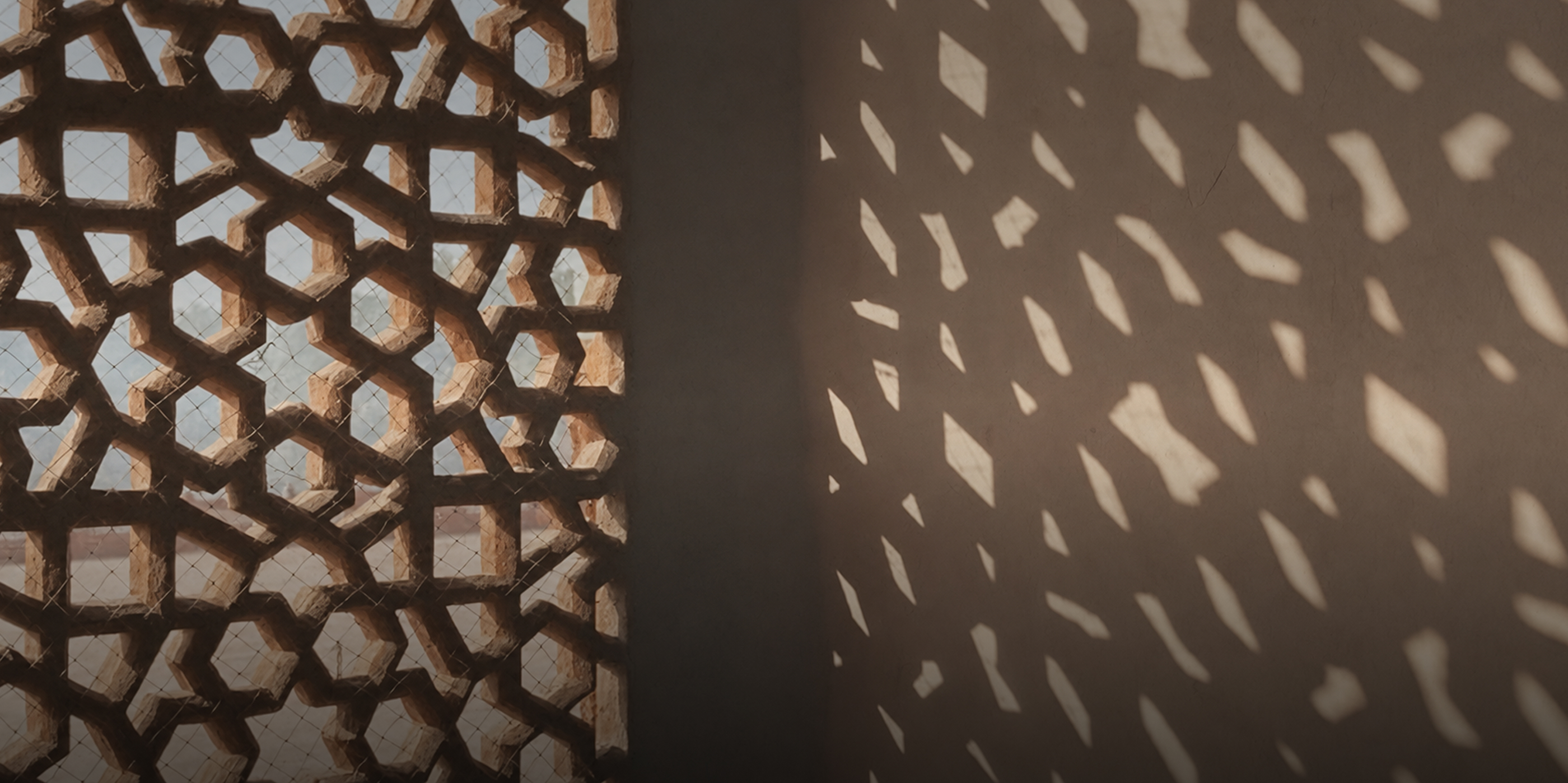 Architectural lattice casting geometric shadows